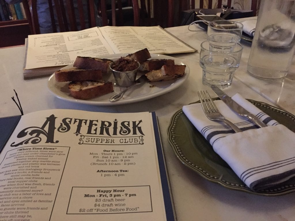 Table setting with menu and silverware