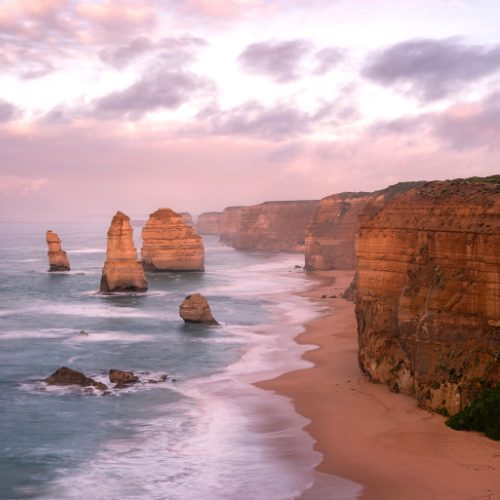 Great Ocean Road Victoria, beach at sunset with mountain cliffs