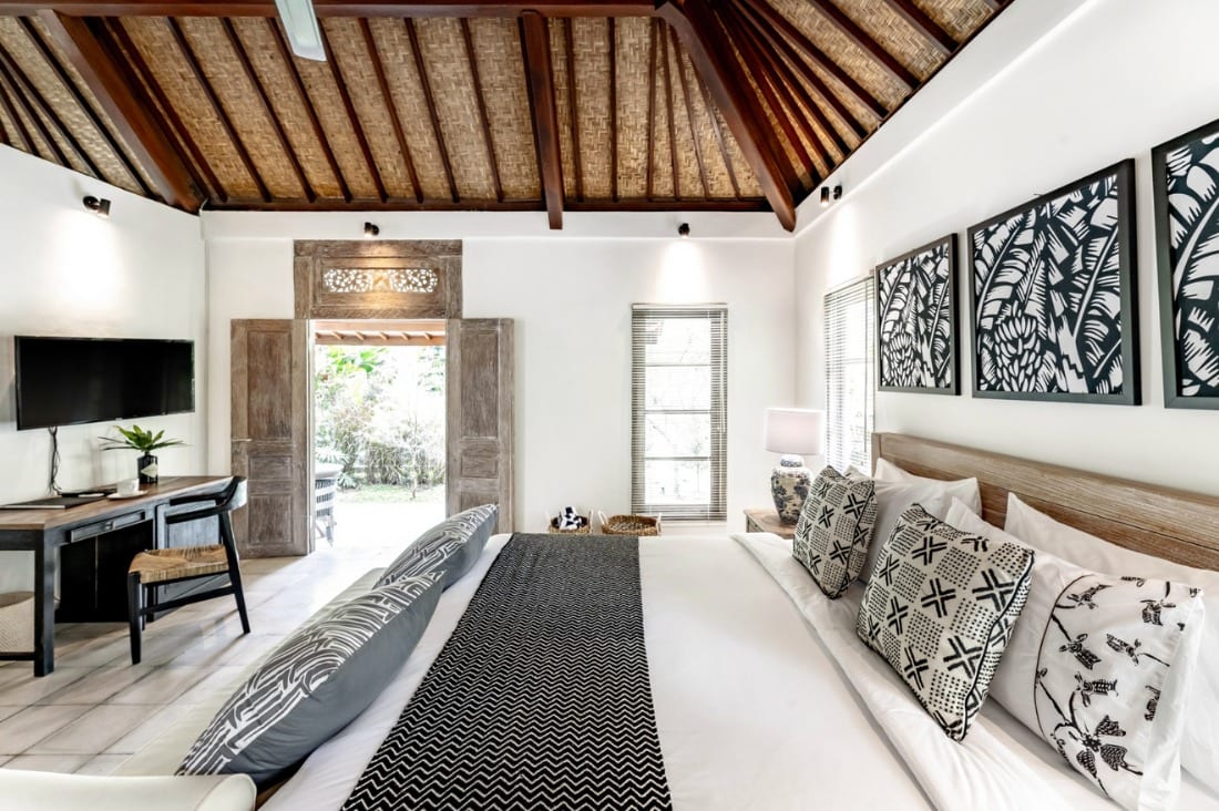 Balinese bungalow bedroom, dreamy Airbnb stays for under $100