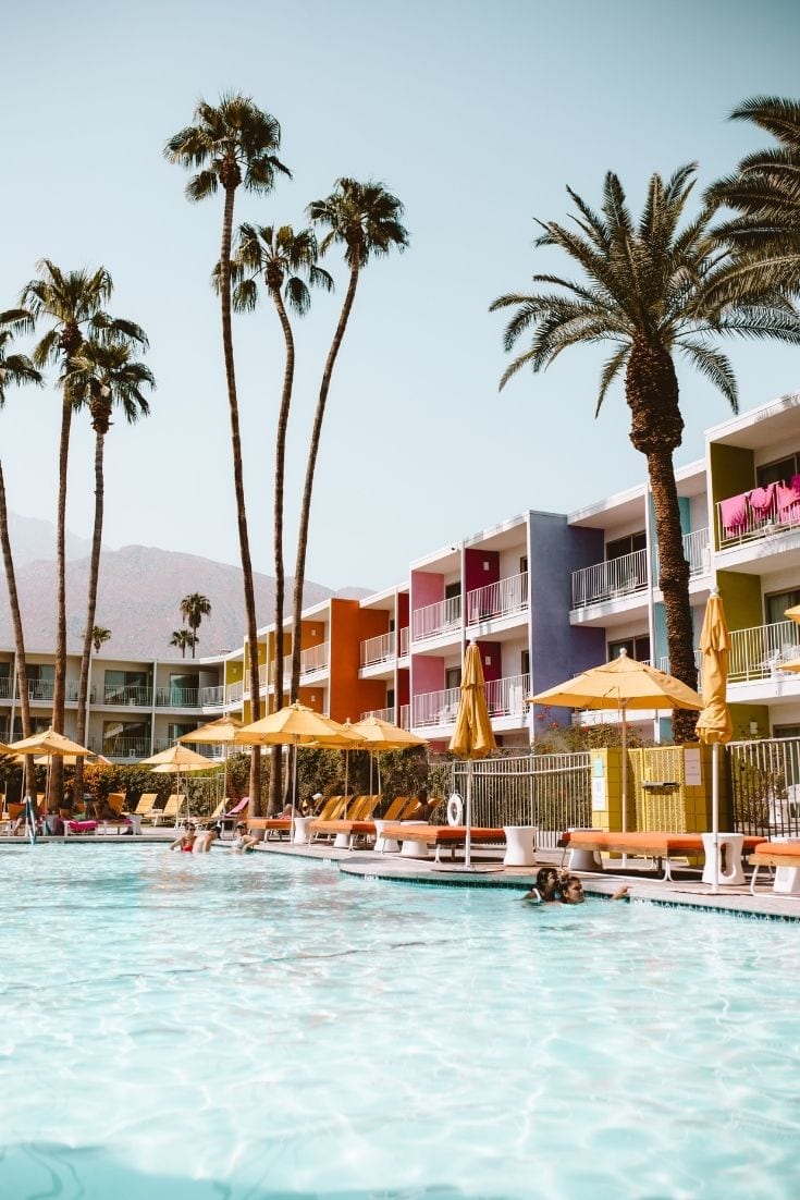 hotel pool with palm trees, Best Summer Weekend Getaways In The USA