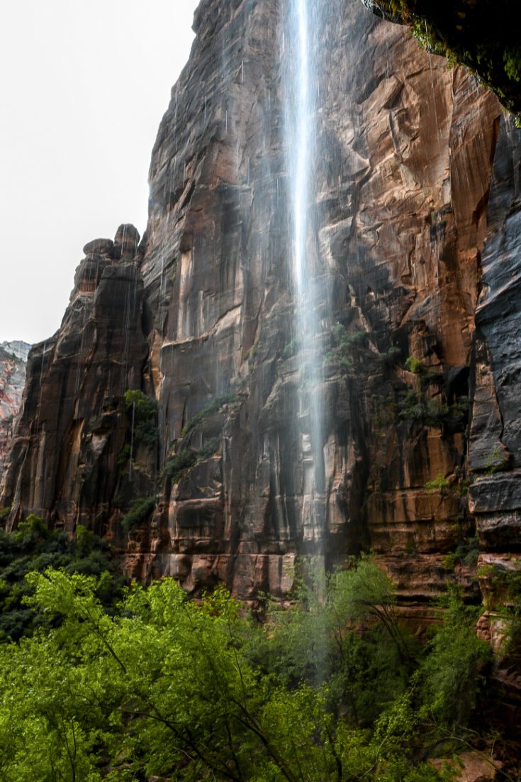 waterfall in front of a tall canyon wall, 2 week west coast USA itinerary 