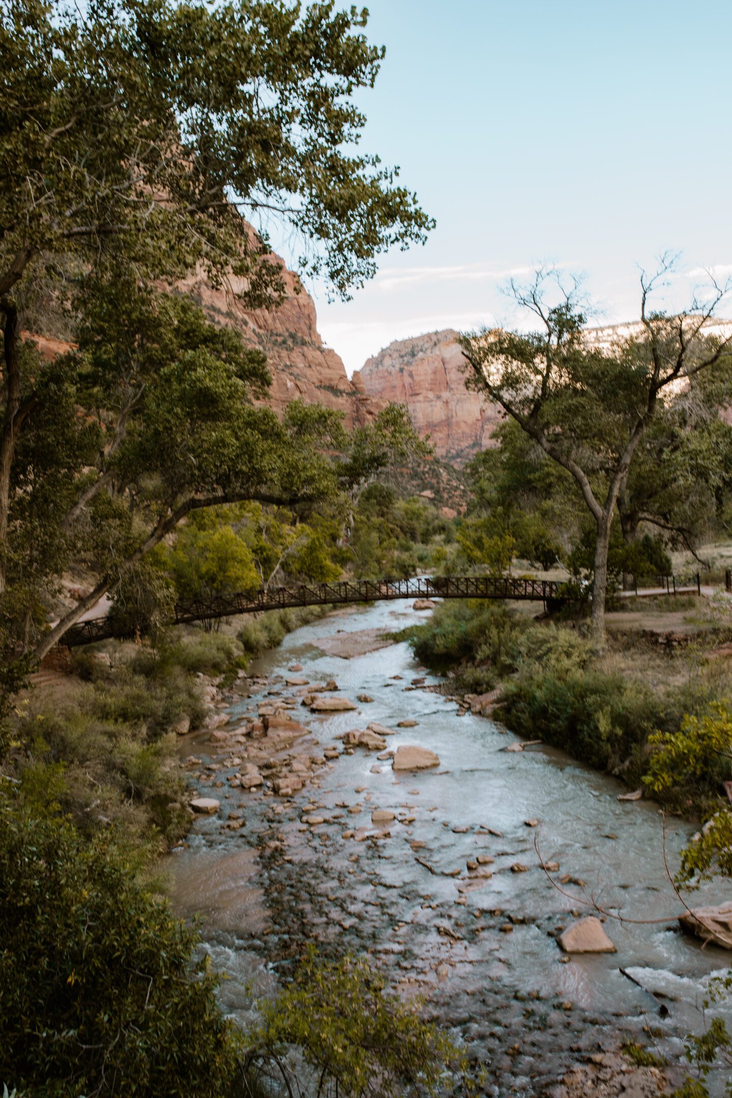 A water stream in a valley with canyons