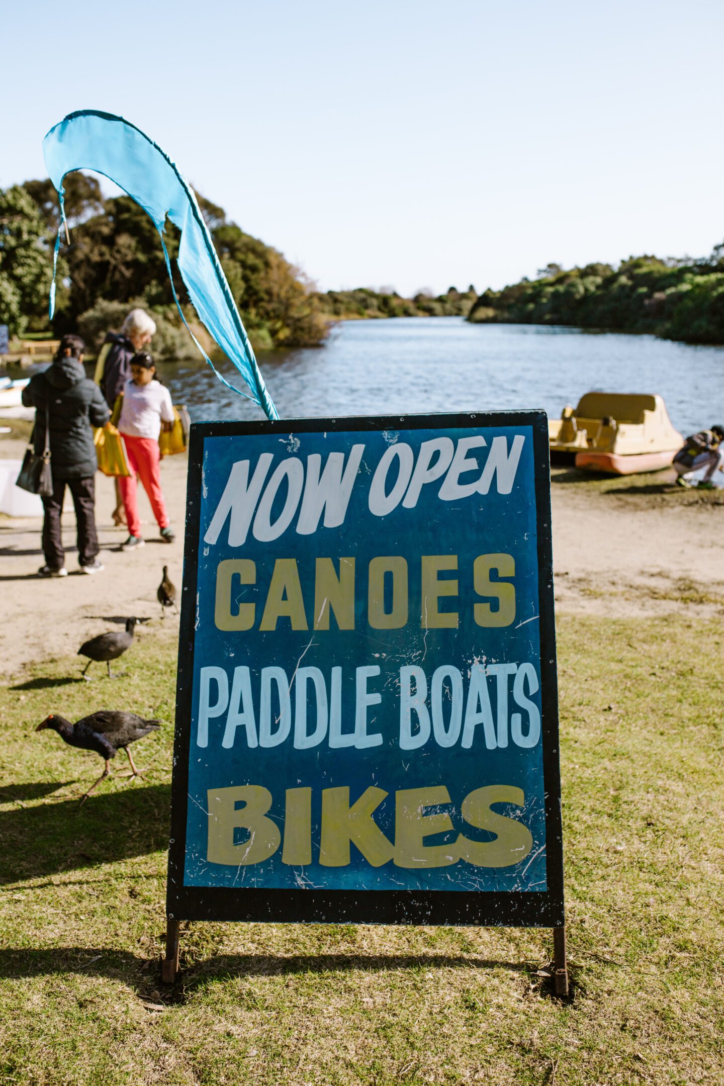 Sign thats says now open, canoes, paddle boards, bikes, things to do in Warrnambool