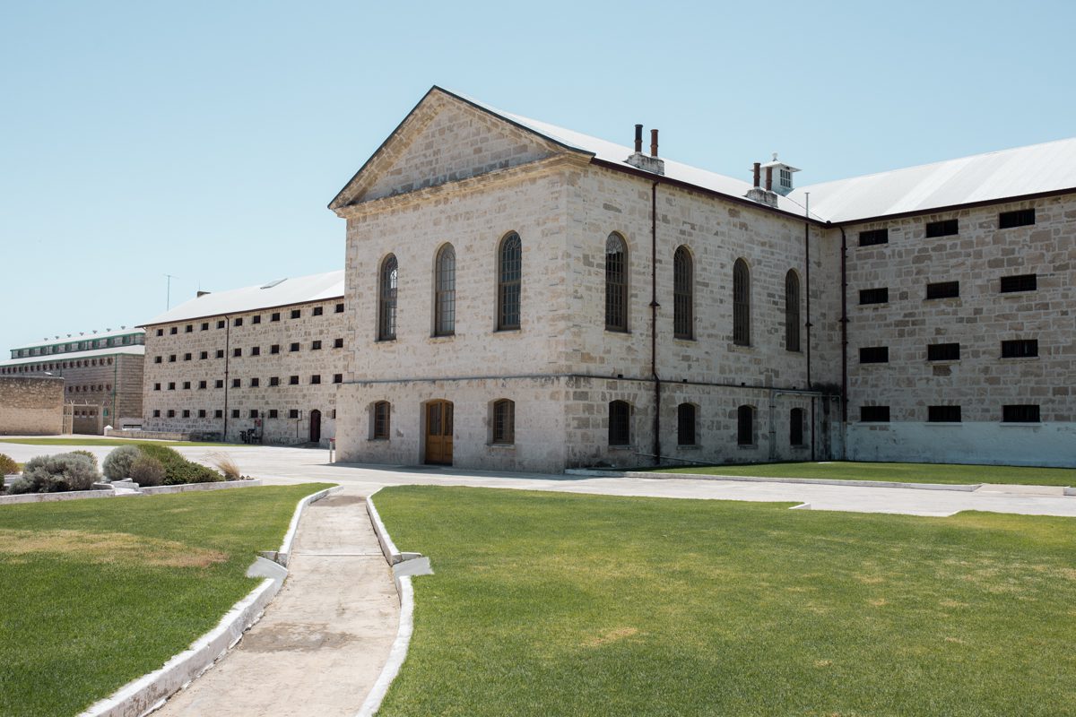 Fremantle Prison, a landscape photo to an entrance of an old stone brick prison 